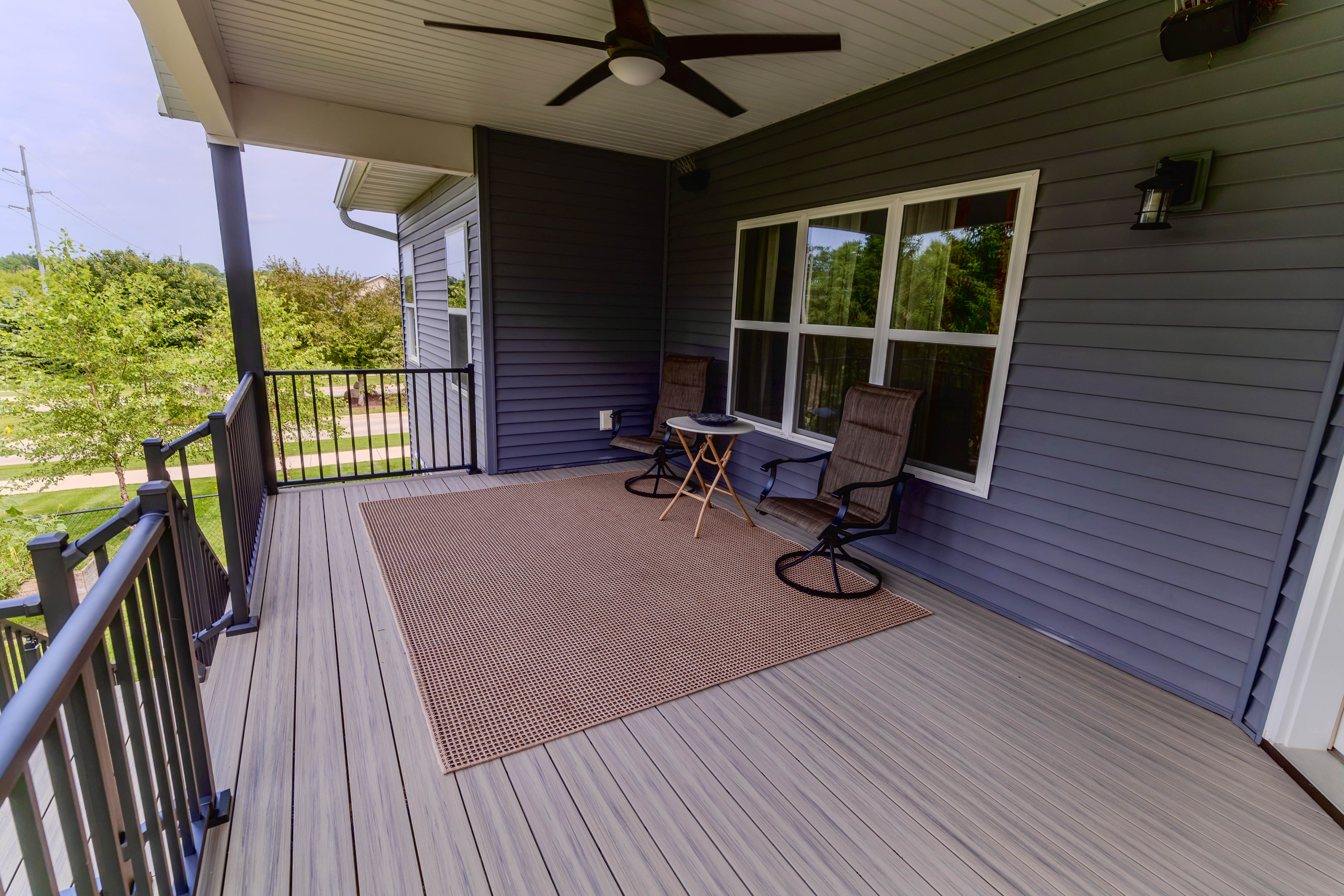 Custom composite deck with aluminum railing built in Eastern Iowa